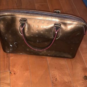 Like new bronze Arcadia purse